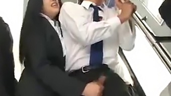 Japanese Beauty Gives A Handjob On A Public Bus